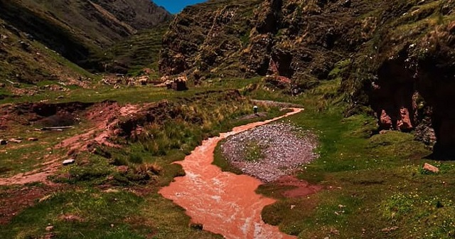 Crimson Veins: Unveiling the Mystique of the Red River in Cuzco Valley, Peru